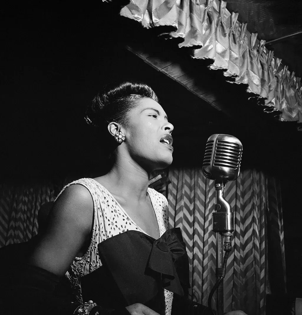 Billie Holiday singing at the Downbeat club in New York, about 1947
